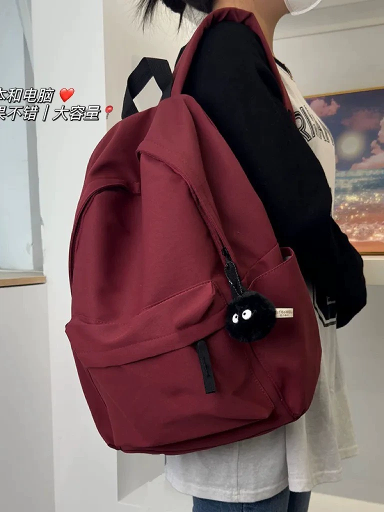 Korean version ins schoolbag female middle school student large capacity simple solid color backpack junior high school high school college student backpack male