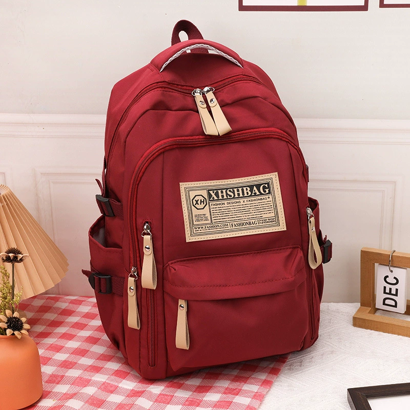Female large-capacity schoolbag, male high school junior high school student, middle school student backpack, elementary school student 4-6 grade college student backpack
