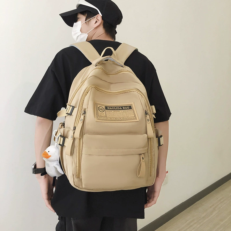 Cross-border backpack women’s spring and autumn simple travel computer backpack male high school junior high school student large capacity student school bag