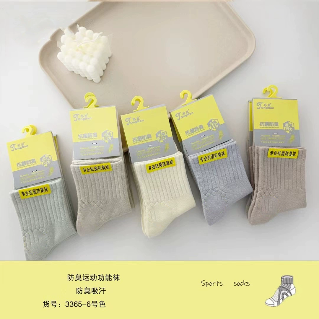 Free shipping winter women’s functional sports socks massage bottom paper card deodorant high waist socks solid color combed thickened mid-tube socks